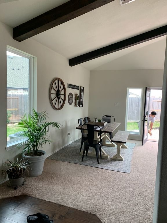 Finished open living and dining space